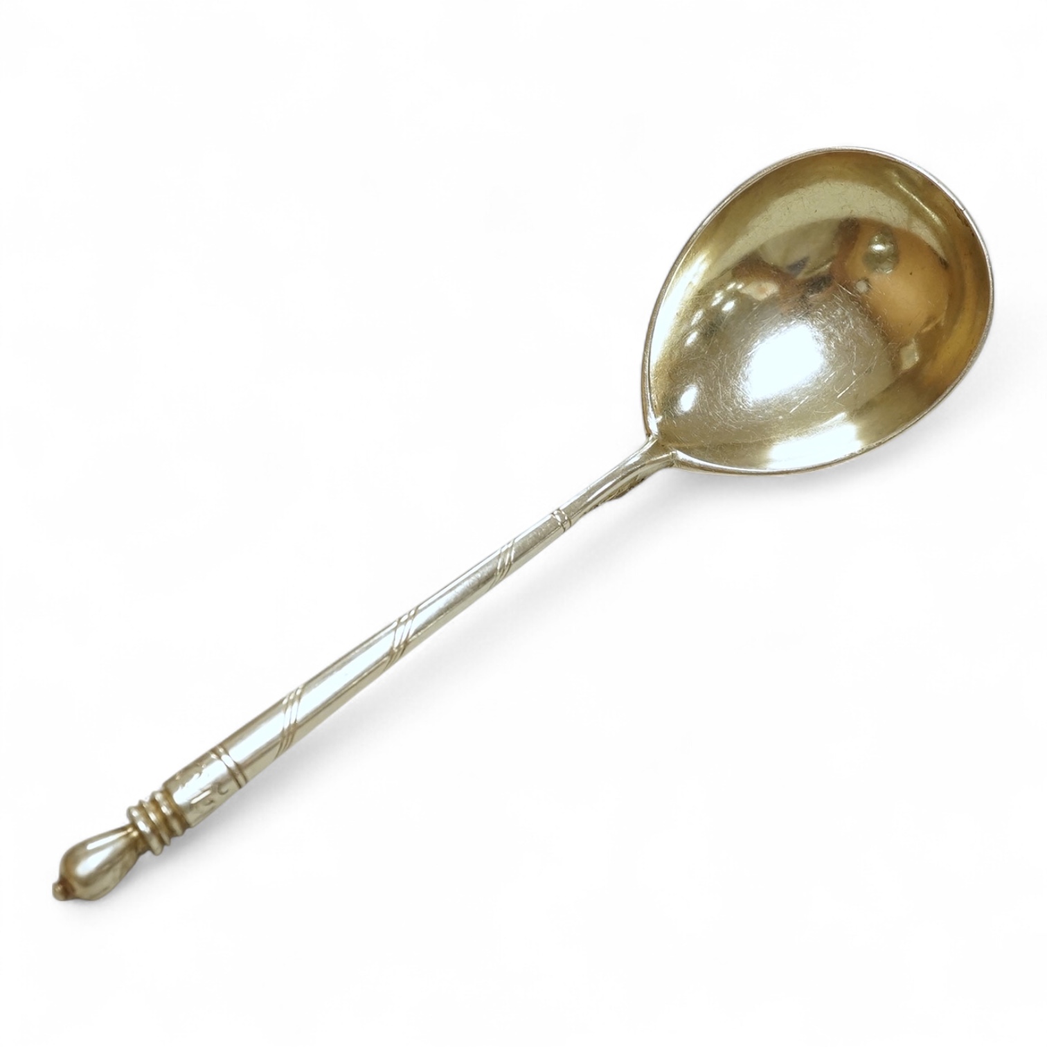 A mid 19th century Russian 84 zolotnik and niello spoon, assay master probably I. Avdyeyev, Moscow, 1857, 18cm.